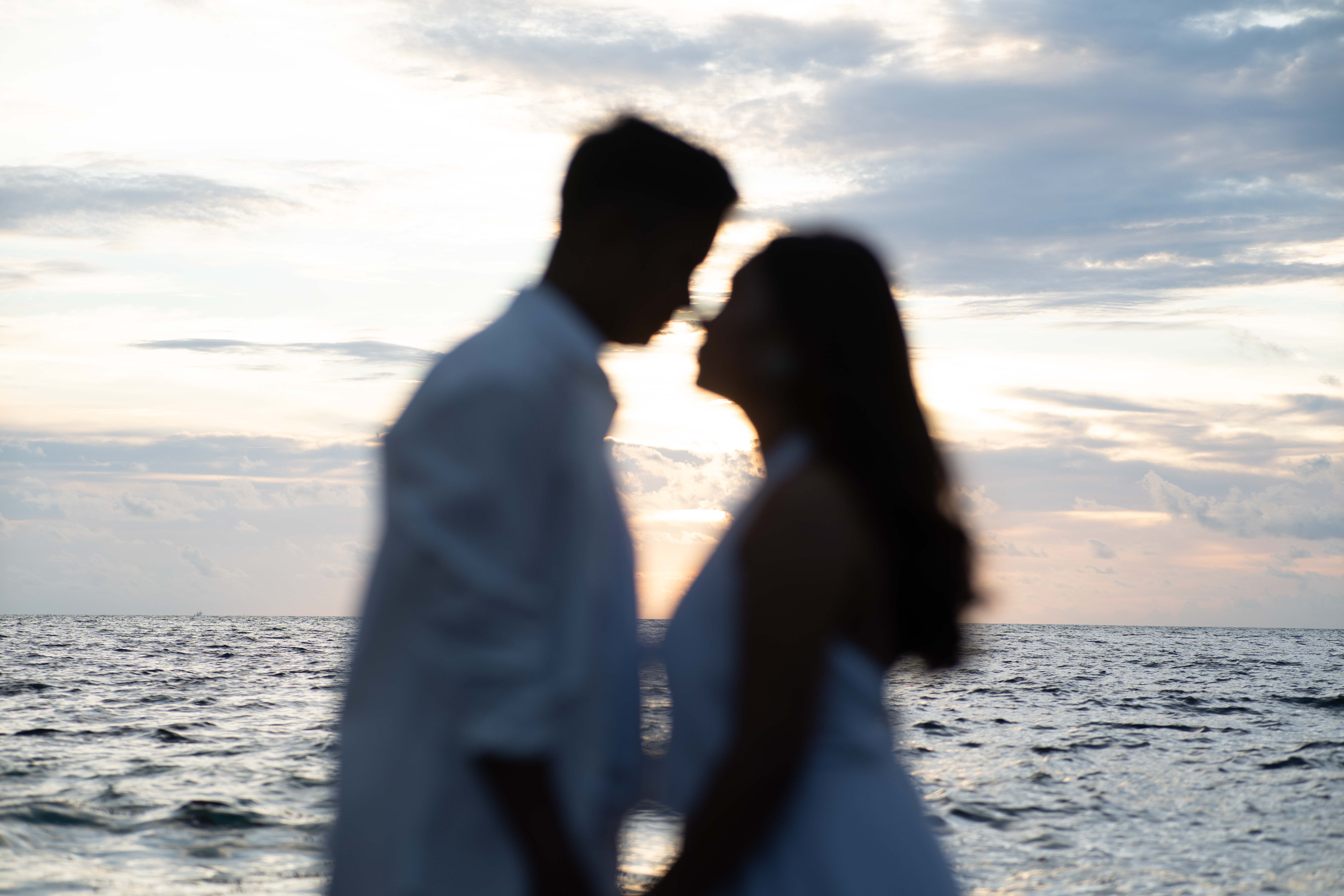 Prenup by the shore, holding hands